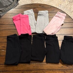 9 pairs size 4 Cat & Jack leggings. - Black, Gray, Pink